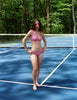 On model, editorial image of the pink bikini top and bottom 