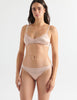 woman in beige silk chiffon and charmeuse thong