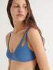 a model in elias bikini top in fog blue a