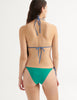 back view of model wearing nelle bikini top and nadia bikini bottom in viridian 