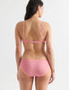 Back view image of model wearing pink underwire bra with yellow trim and matching panty. 