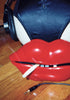 Headphones, navy panty, red lips, and cigarette