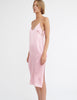 woman wearing pink silk slip dress by ARaks