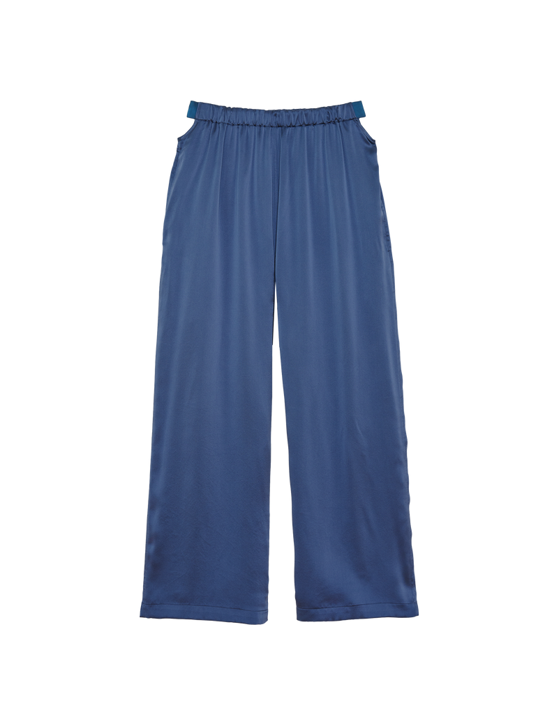 blue silk pants with exposed elastic on waist by Araks