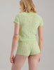 back view of green lace t-shirt and shorts