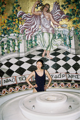 Swimming in  Loutraki ~ It's Greece's oldest spa town. How it exists now is a strange and wonderful mix of mosaic-tiled bathhouses next to faded mid-century hotels.