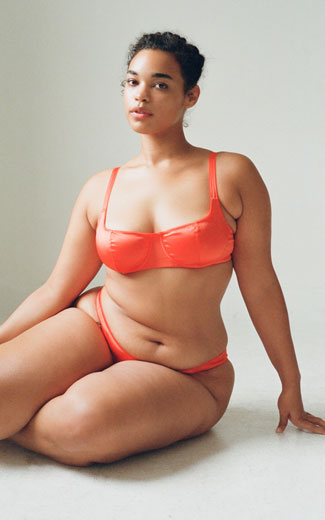 A model wearing the Gita silk underwire bra.