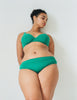 A model wearing the Waverly Underwire bra in Emerald Stretch lace.