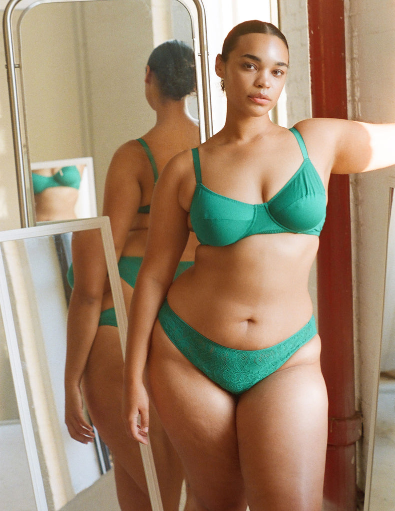 a model wearing the beau in emerald green cotton
