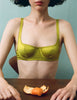 Model wearing Araks gita bra in Chartreuse 
