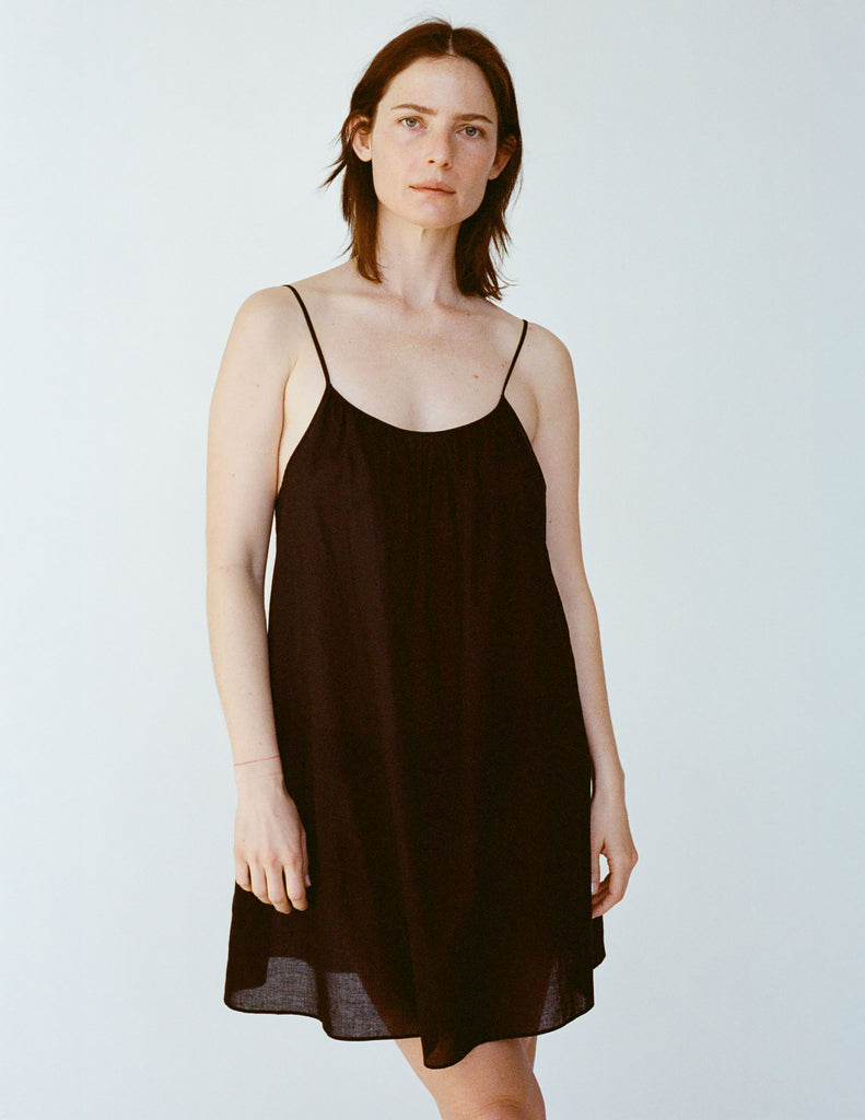 Girl in Sarra  sheer black cotton slip