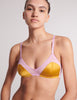 detail of yellow and pink silk bra