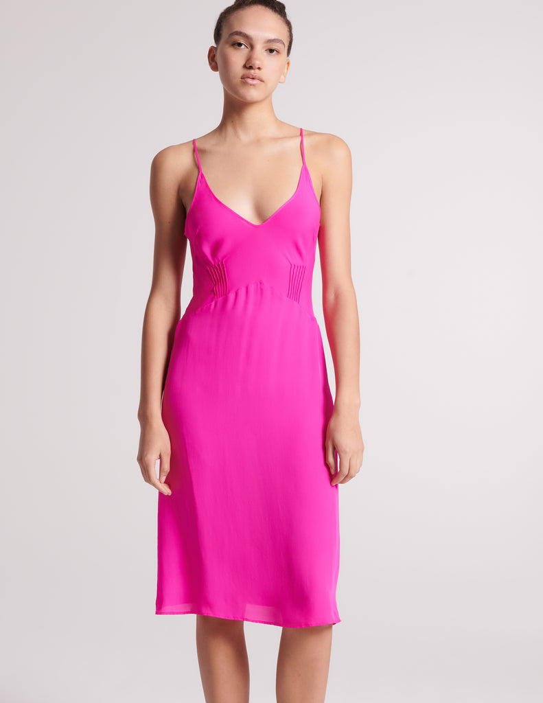 On model image of hot pink slip dress