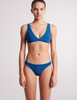 On model image of blue bikini top and bottom
