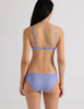 A model in the araks antonia bralette and isabella panty in rococo blue