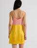 A model in the araks silk charmeuse holly slip in pomelo yellow