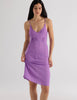 A model in the araks silk cadel slip in viola purple