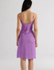 A model in the araks silk cadel slip in viola purple