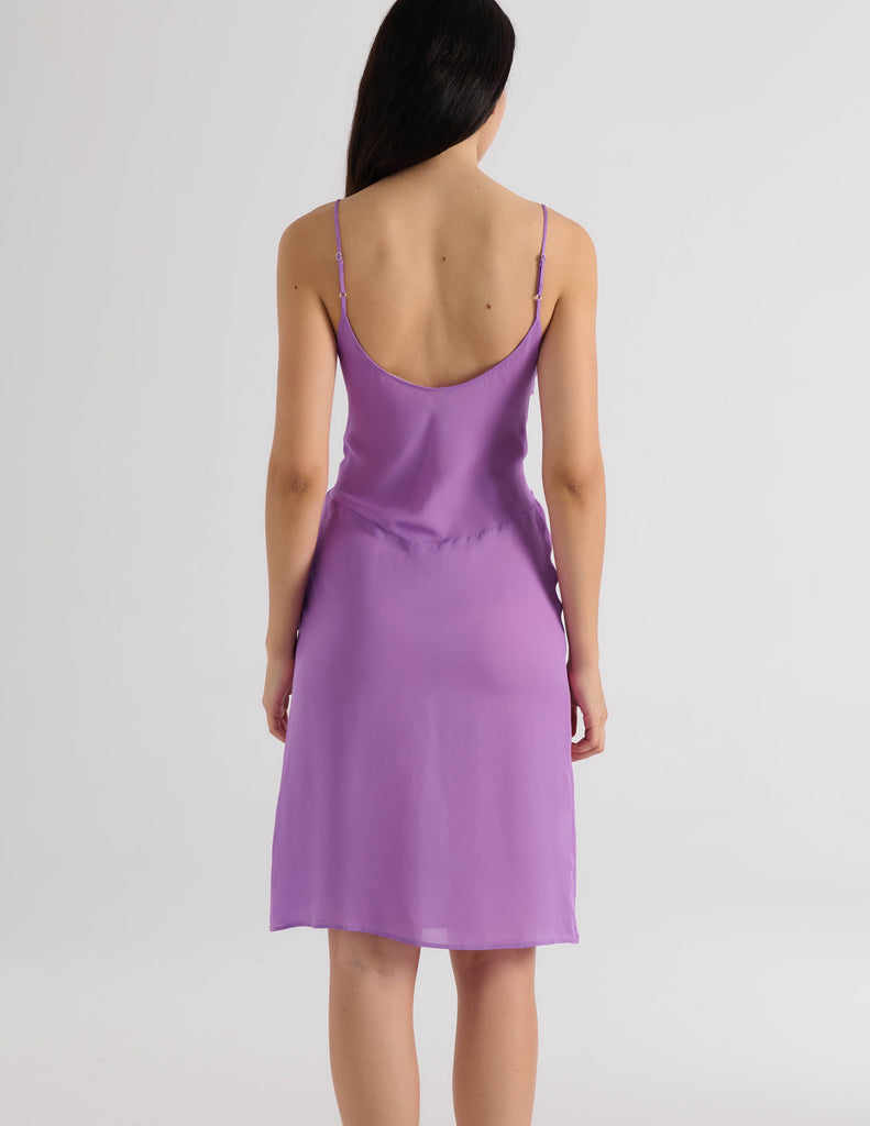 A model in the araks silk cadel slip in viola purple
