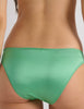 A model in the araks silk charmeuse penelope bralette and gwyneth panty in cypress green