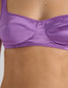 A model in the araks silk penelope bralette and gwyneth panty in viola purple