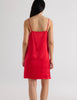 A model in the araks silk charmeuse toulouse slip in scarlet red