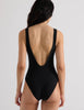 Model wearing Araks Harley one piece bathing suit in black