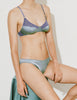 Model wearing Araks Willow bralette in Aegean blue