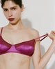 A model wearing Willow bralette in Raspberry against a plain light gray background.