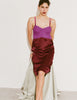 Model wearing Araks Ingrid slip in garnet