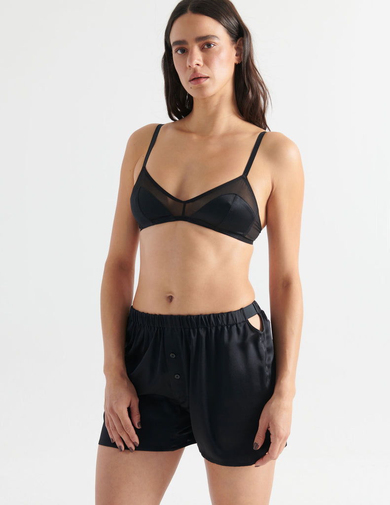 woman in black silk bra and boxer short