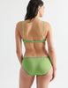 Back view image of model wearing green cotton panties with blue trim and matching bralette. 