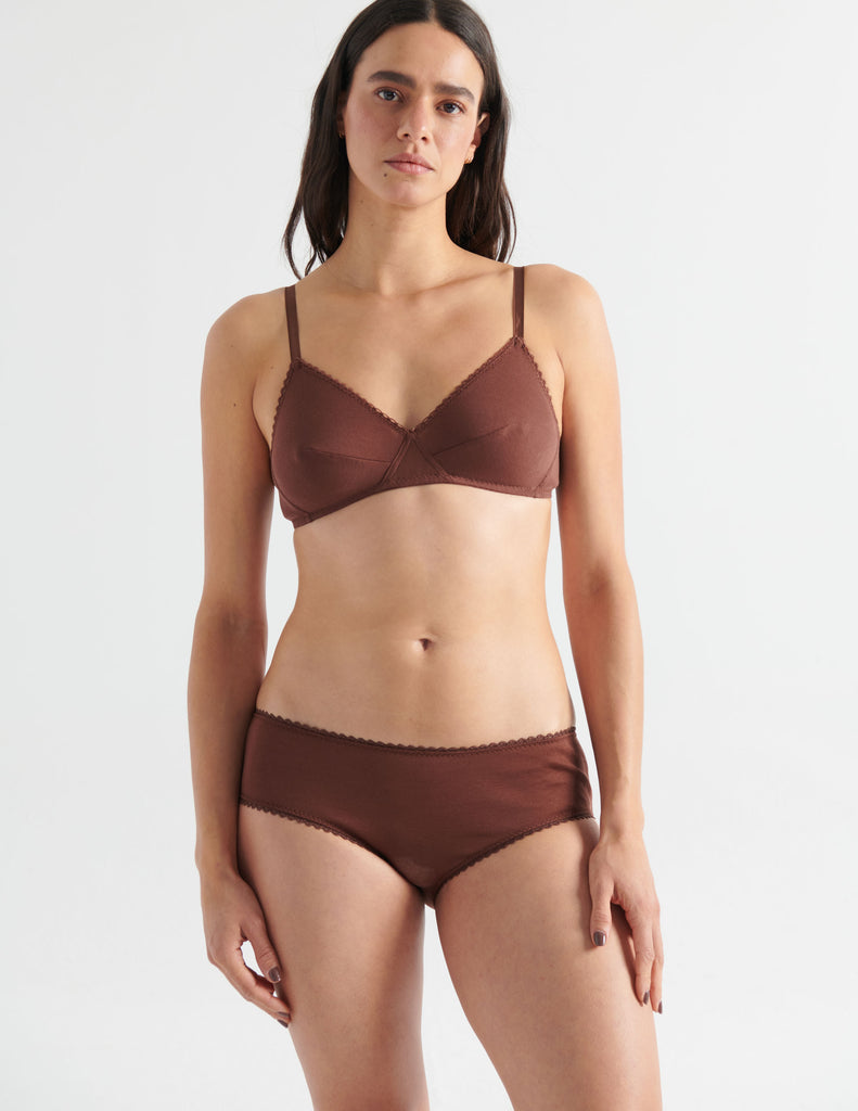 woman in brown cotton bralette and hipster