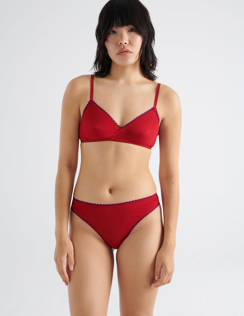 on model front view of woman in red cotton bra and thong