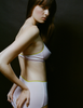 A model in the araks organic cotton antonia bralette mabel hipster in confection pink