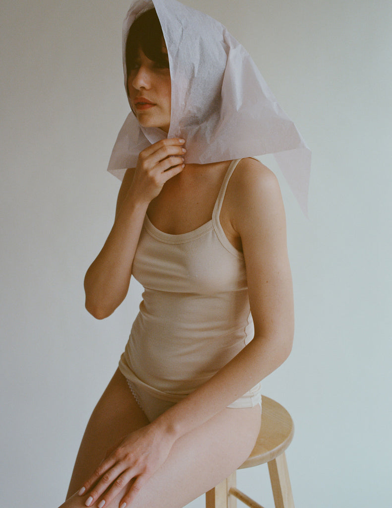 A model in the organic cotton araks cambra tank and isabella panty in undyed unbleached chemical free cotton
