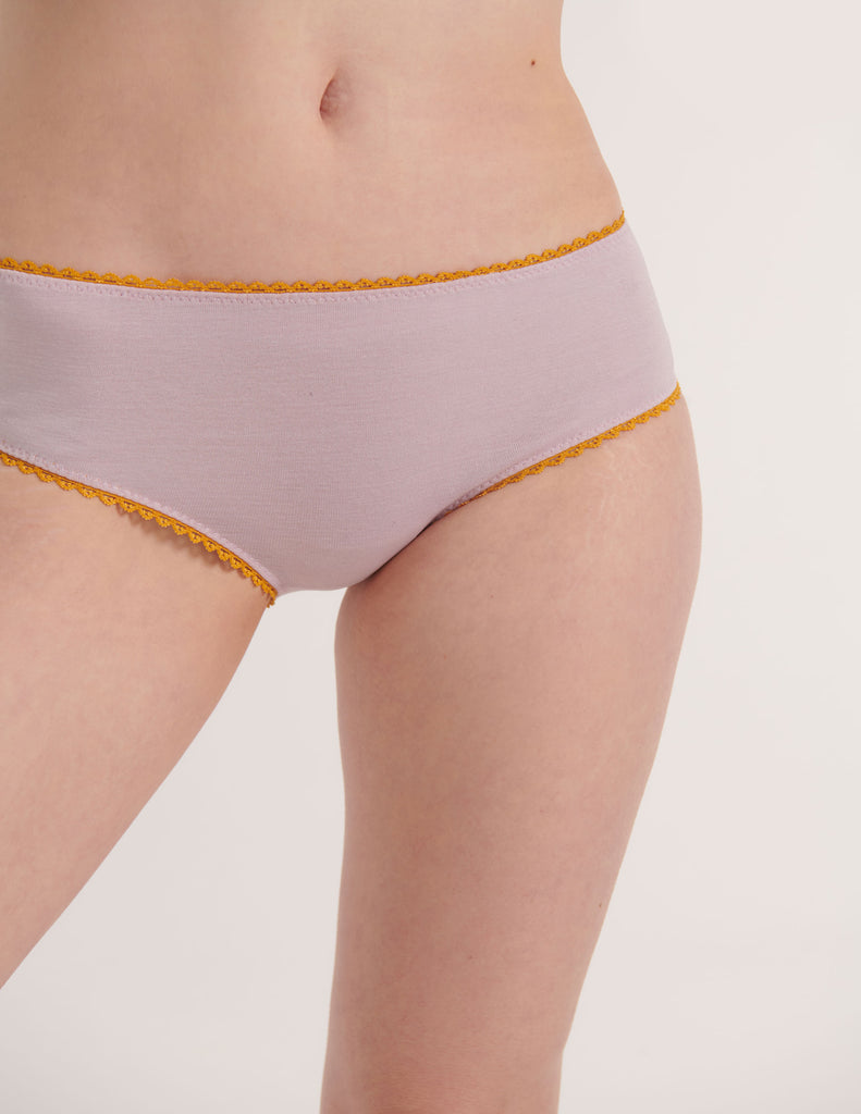 a model in the araks organic cotton josephine hipster in fairy lavender