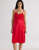A model in the araks ingrid slip in scarlet