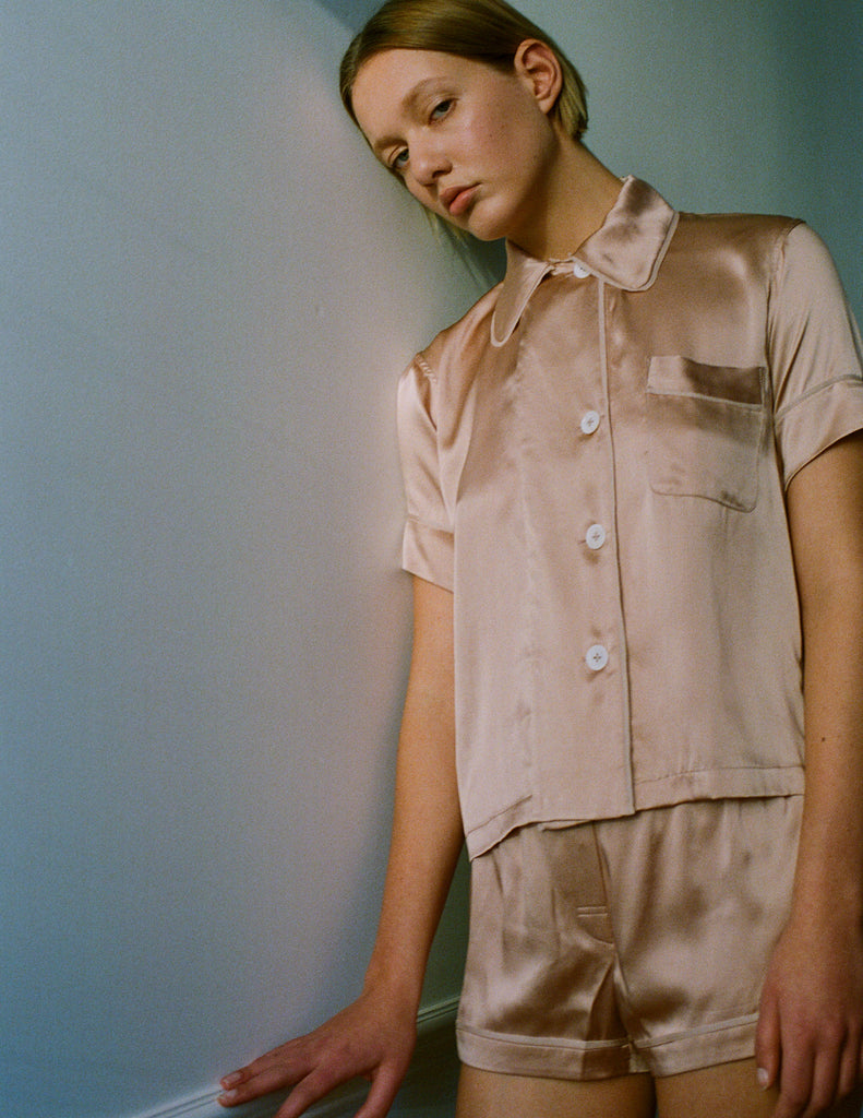 A model in the Araks shelby pajama top and tia boxer in bare