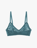 a flat lay image of the araks stretch lace tamara bralette in heron blue