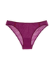 A model in the araks cotton crepe harriet panty in cranberry red