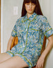 A model in the araks liberty of london shelby pajama top and tia boxer in daisy