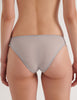 A model in the araks cotton crepe harriet panty in mist grey blue