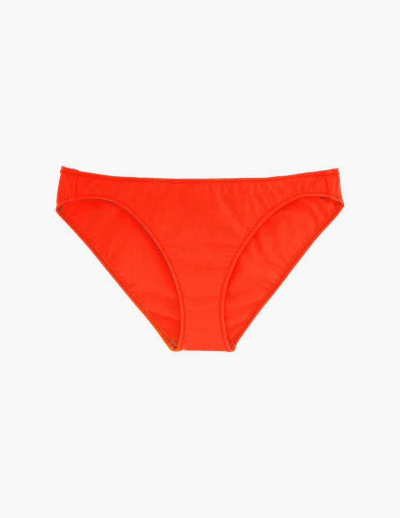 Araks bright orange bikini bottom on a plain light gray background.