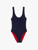 Araks Navy swimsuit with red polka dots on a white background