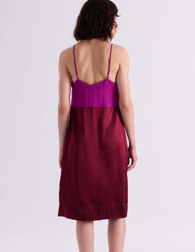 Model wearing Araks Ingrid slip in garnet