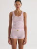 A model in the araks organic cotton james tank and presley short in confection pink