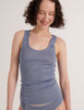 A model in the araks organic cotton james tank and isabella panty in feather grey blue