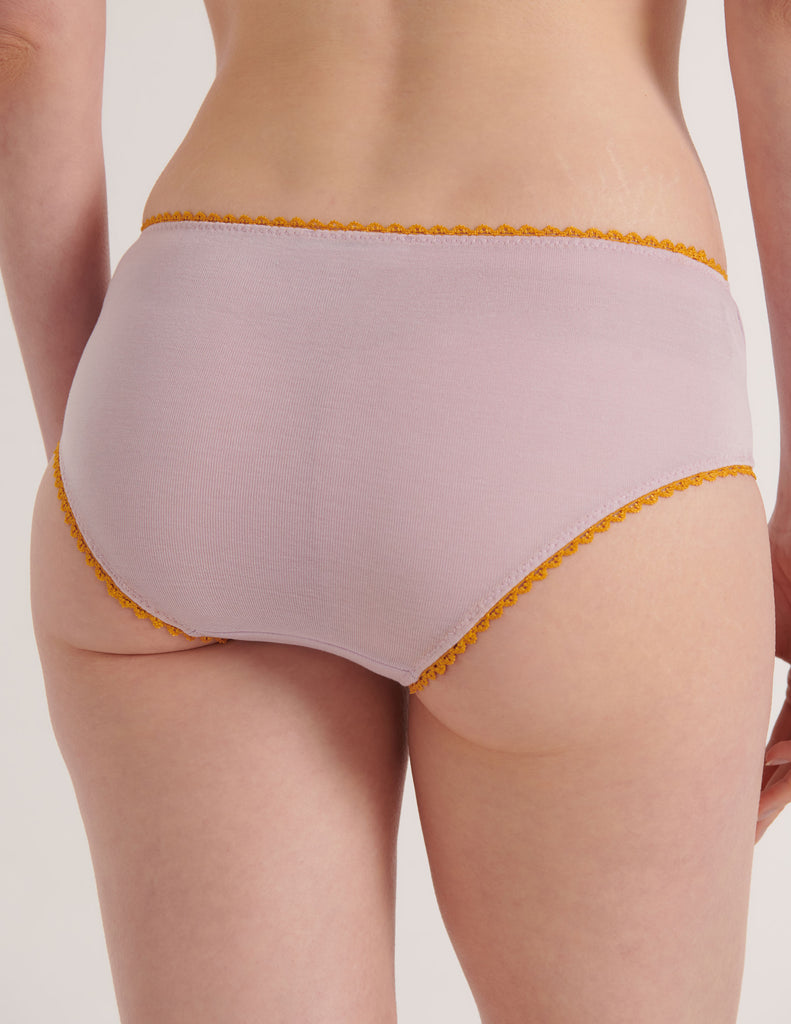 a model from the back in araks organic cotton josephine hipster