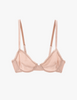 Flat image of araks organic cotton sand colored cotton sofia underwire bra with matching trim.